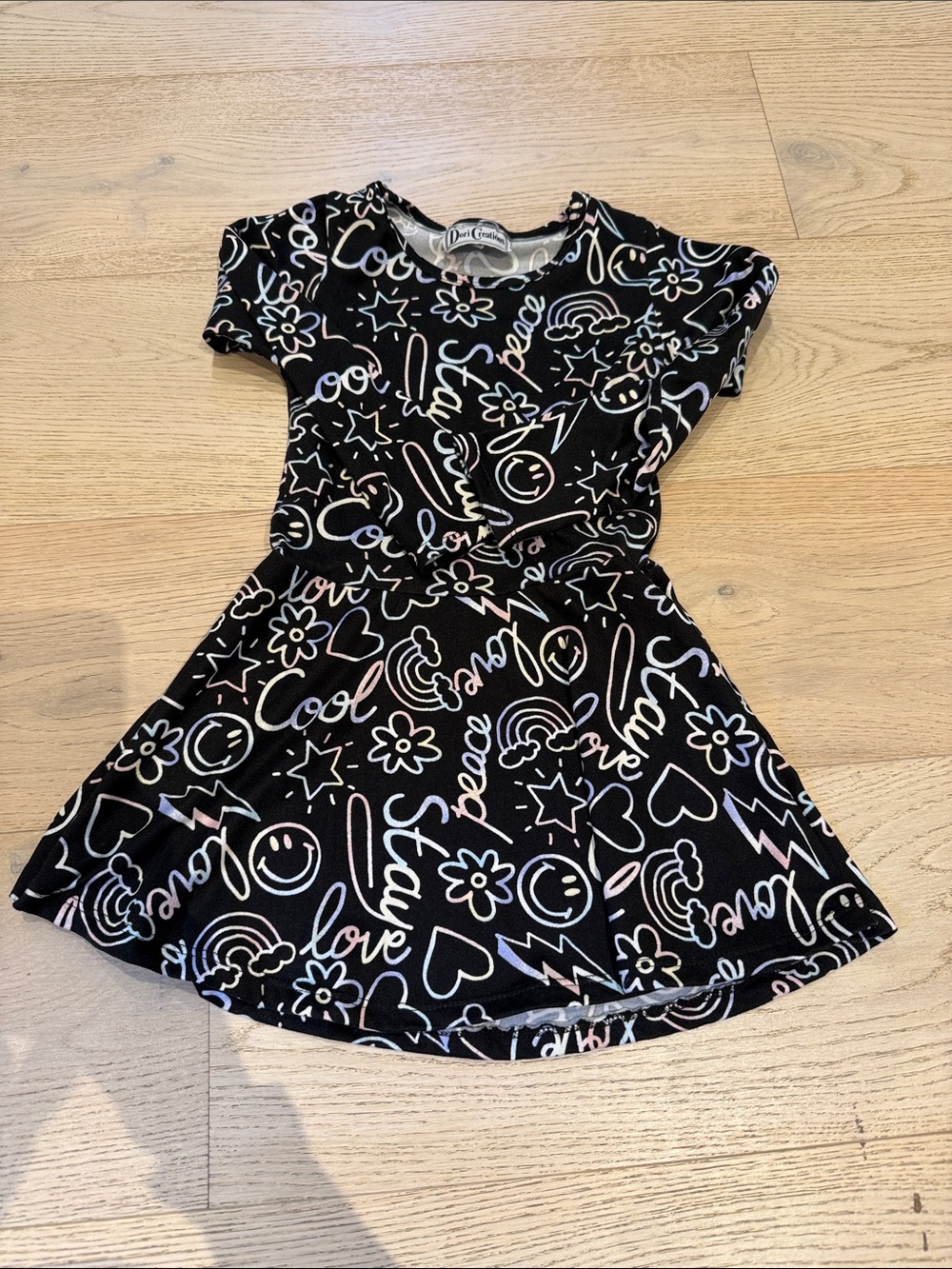 Girls Black Graphic Skater Dress with Pastel Doodle Print